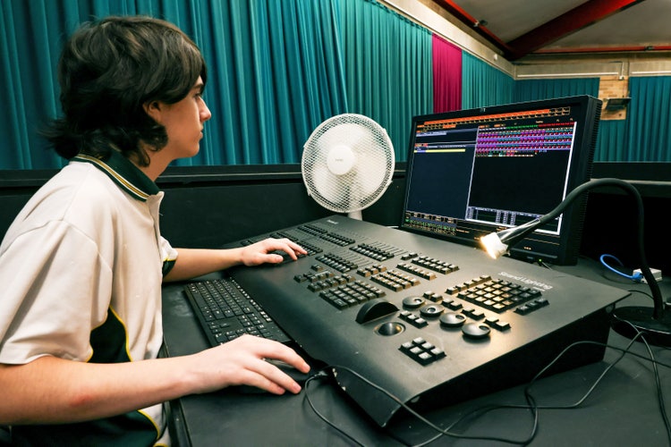 student using audio equipment